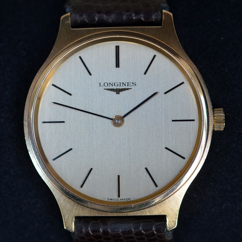logines-wristwatch-18k-yellow-gold-33-mm-size-cal