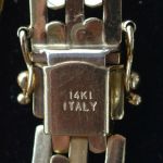 14-karaat-gouden-panther-rolex-schakel-armband