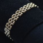 14-karaat-gouden-panther-rolex-schakel-armband
