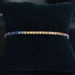 regenboog-saffier-tennis-armband-18k-white-gold