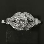 bloemachtige-natuurlijke-diamanten-entourage-ring-wesselton-0-40-ct