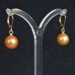 10-11-mm-gouden-zuidzeeparel-bungelende-oorbellen-oorhangers-18k-geel-goud