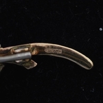 goud-zilver-diamant-broche-bungelend-aapje-broche