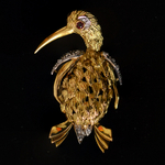 geelgoud-platina-broche-vogel-achtkant-geslepen-diamanten-robijn